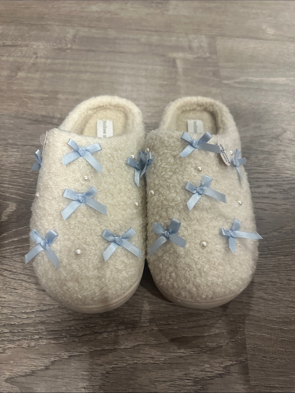 Cozy Cream Slip-On Slippers with Light Blue Bows